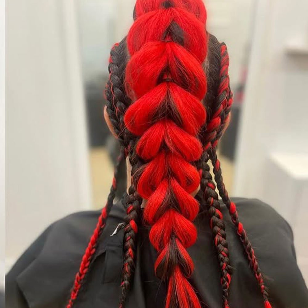 Viking-Inspired Mohawk Braids with Red Extensions
