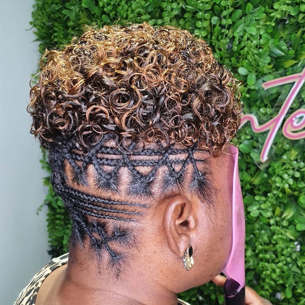 Curly Mohawk with Patterned Cornrow Sides