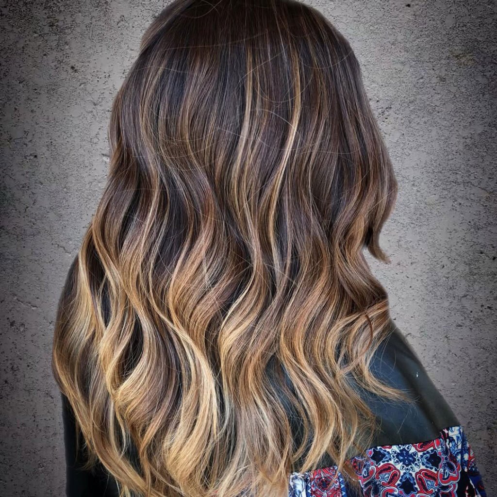 Buttery golden tones melt through darker strands — a cozy, sweet blend that evokes cinnamon toast mornings.
