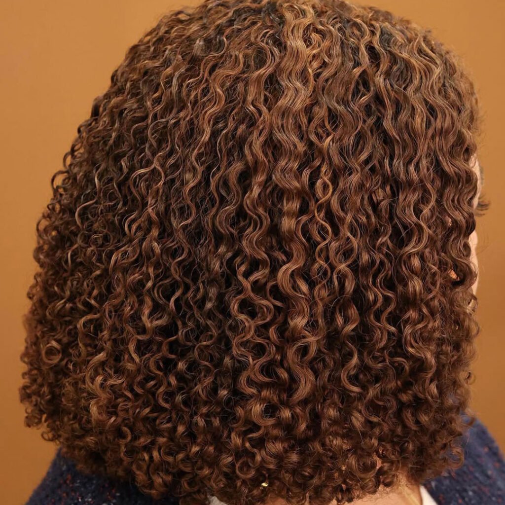 Soft waves in a cropped cut &mdash; subtle texture and sweet simplicity that speaks volumes.