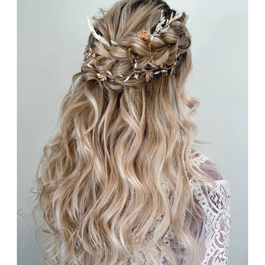 Boho half-up hairstyle with loose braided waves
