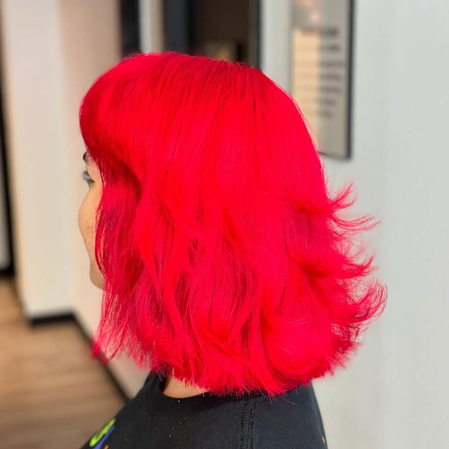 Bright red bob haircut with flipped ends