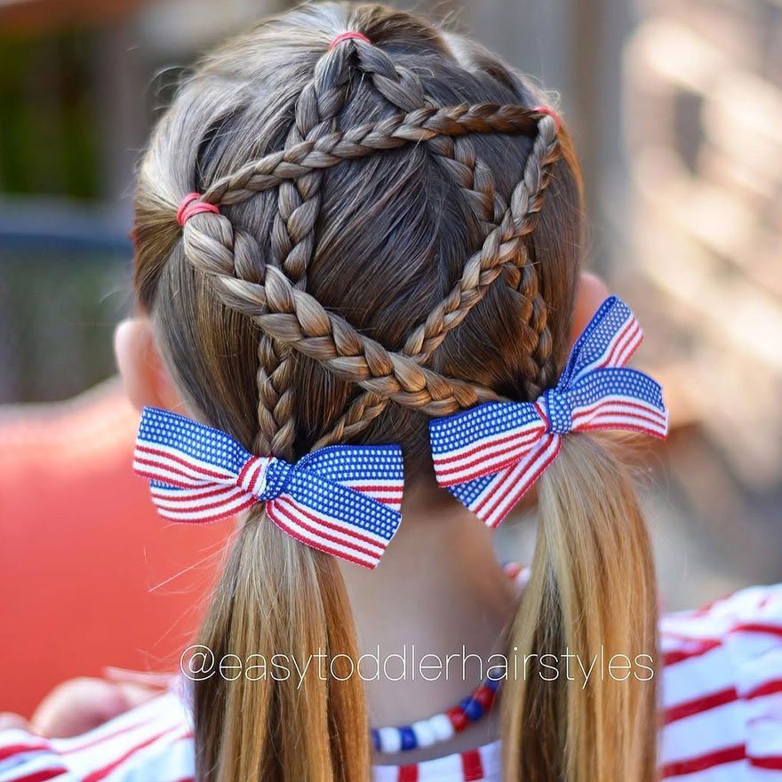 Star braided pigtails hairstyle for girls with ribbons.