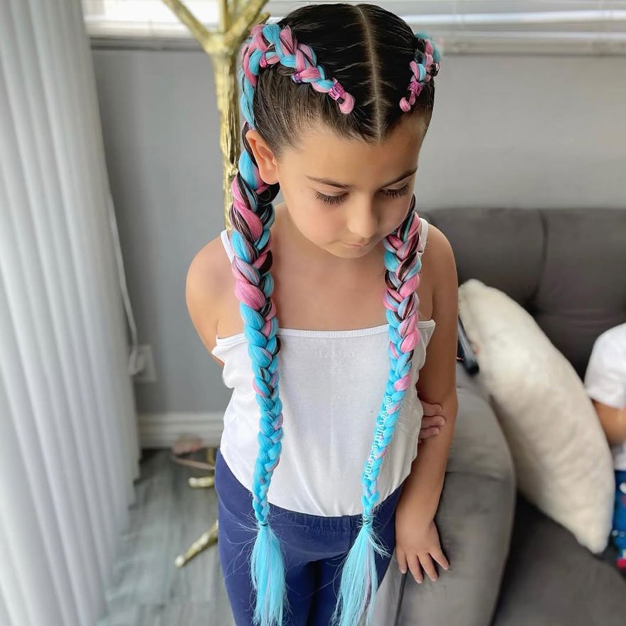 Girl with pastel unicorn waves and mermaid braid hairstyle