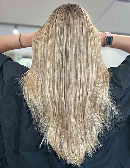 Long straight V-cut with subtle layers and tapered back