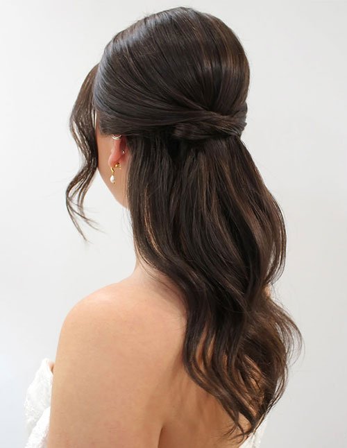 Half-up loose waves bridal hairstyle from the back