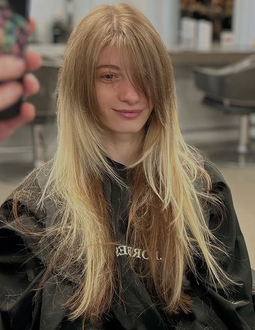 Long shag haircut with soft layers and natural texture