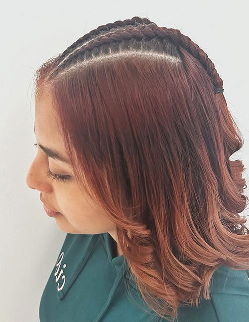 Sleek cornrow pixie hairstyle for women
