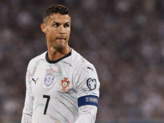 Cristiano Ronaldo in Portugal No. 7 jersey wearing captain armband during match