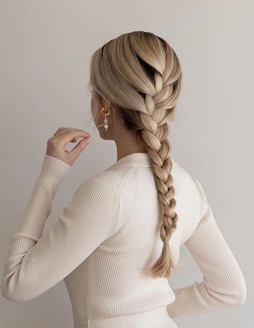 Classic three strand braid hairstyle on long hair