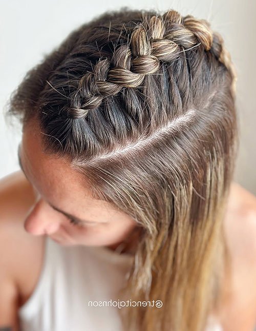 Crown half-up braid on blonde wavy hair
