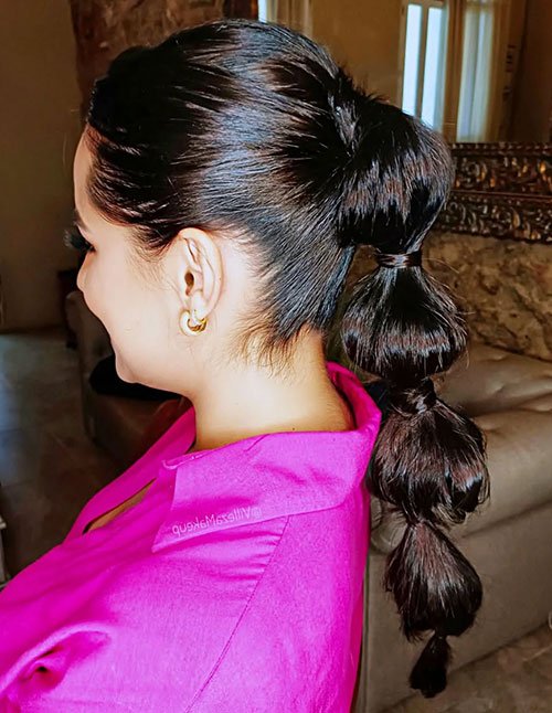 Sleek mid bubble ponytail hairstyle
