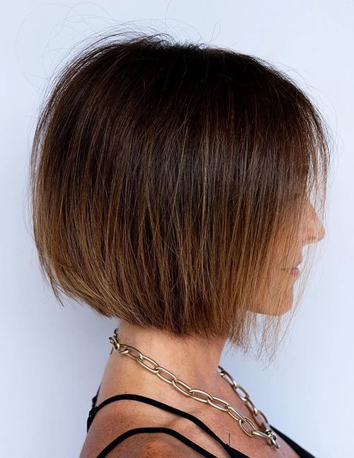 Side-profile blunt bob haircut for fine hair with straight ends and wispy fringe