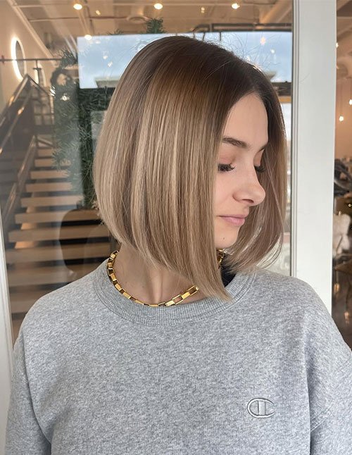 Classy Sleek Bob with straight blunt ends and smooth ash-blonde balayage