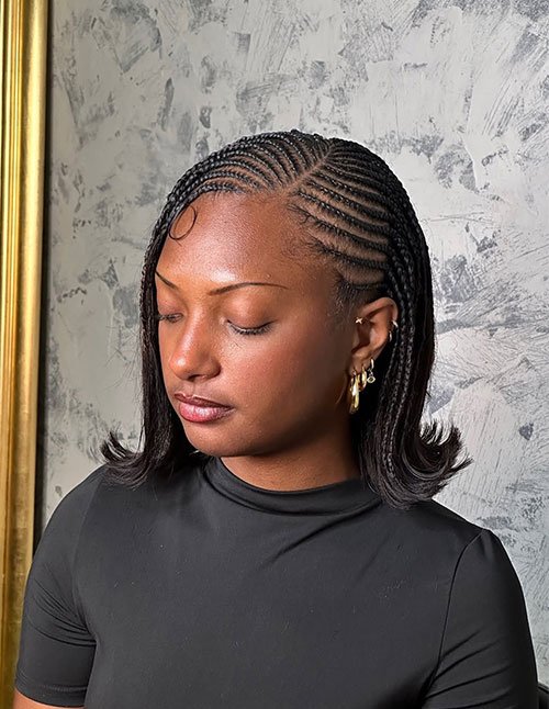 Fulani braids bob with neat side cornrows and a sleek, chin-to-shoulder length bob finish.