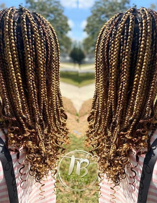Golden highlight braids styled in a shoulder-length bob, finished with loose curly ends for a soft, bouncy look.