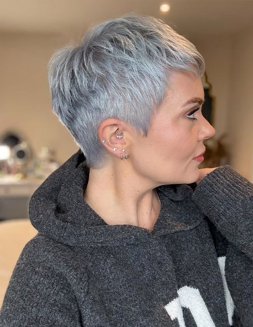 Tapered short pixie cut with silver texture and neat sides