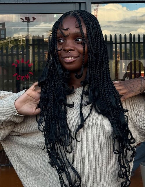 Wolf cut braids with loose layered curls and face-framing pieces